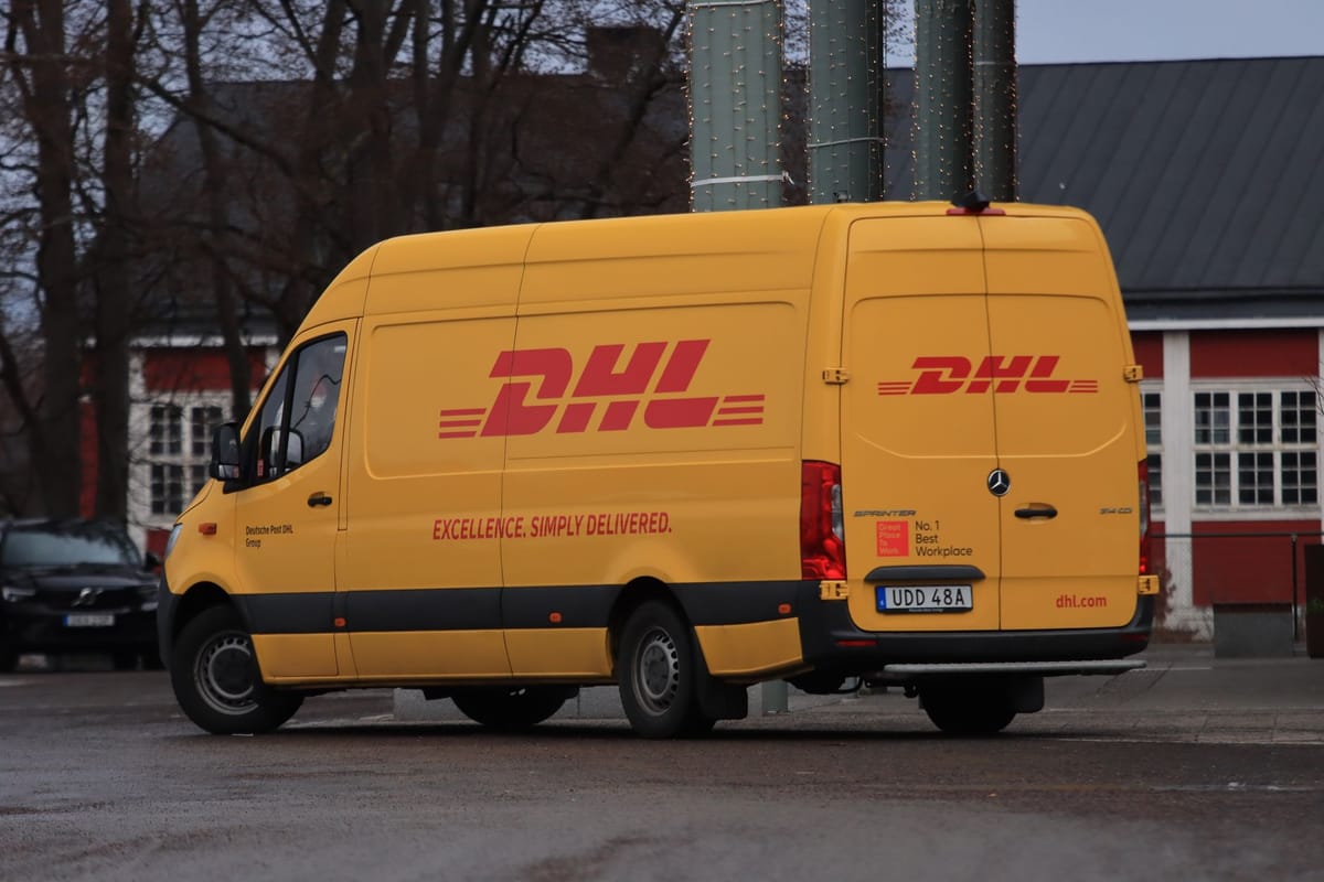 A delivery van with branded vehicle decals