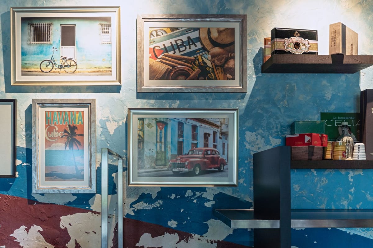 Printed posters displayed on a wall