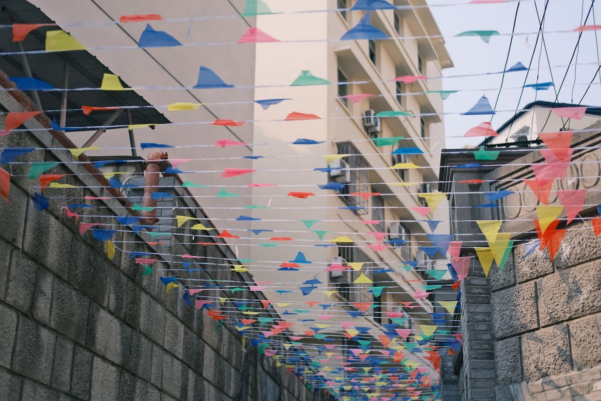 String bunting strung across a street for a festival