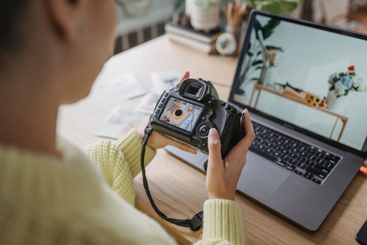 A photographer reviewing an image on screen