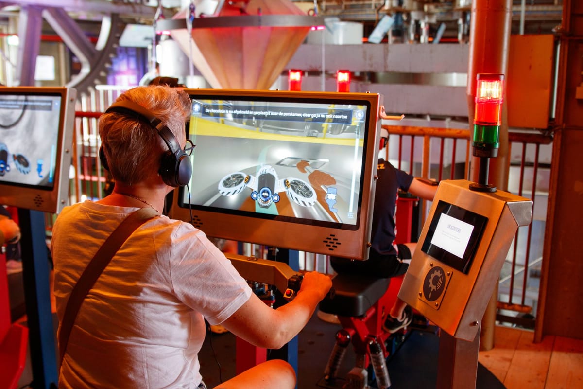 Visitors engaging with an interactive booth demo