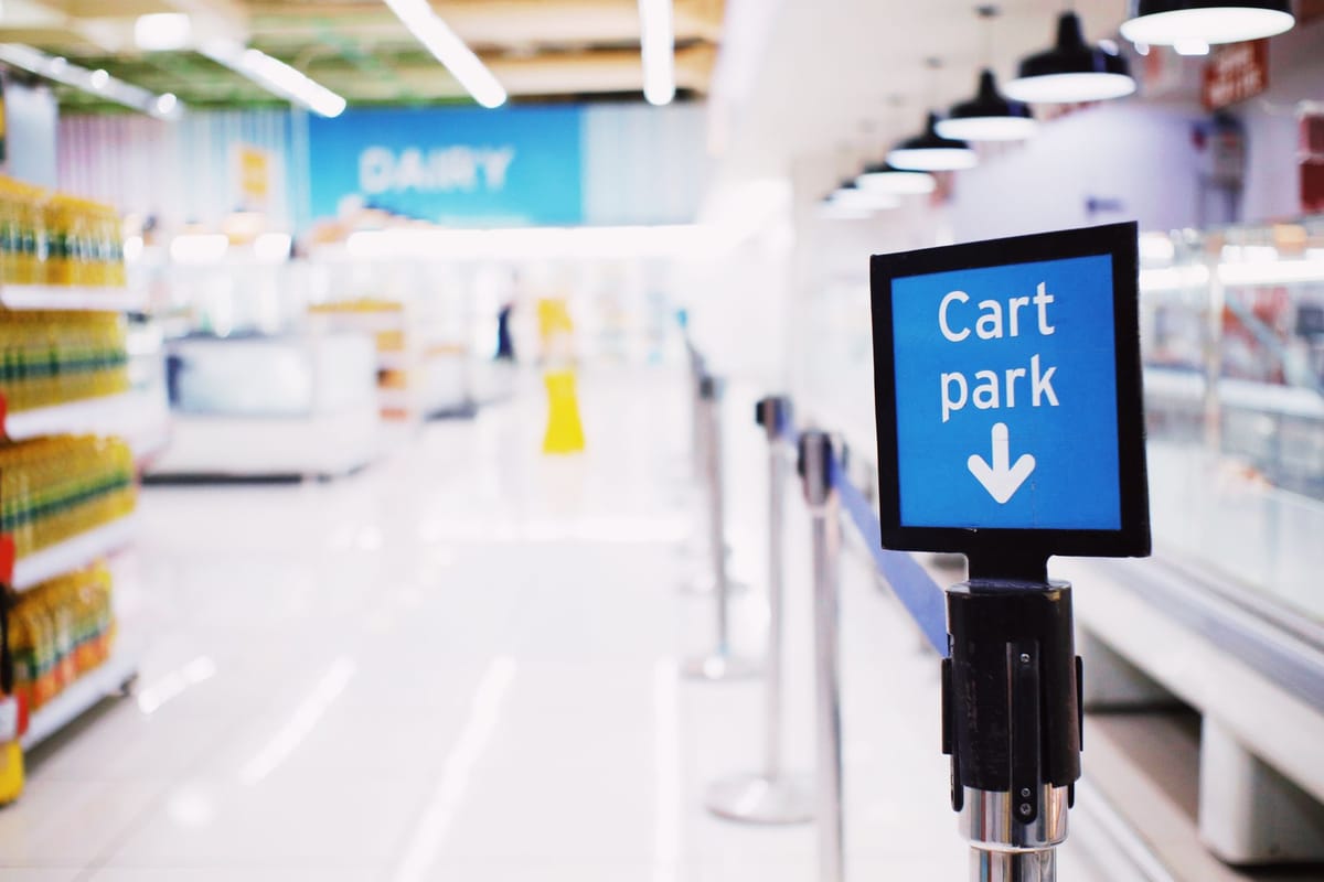 An indoor sign inside a retail space
