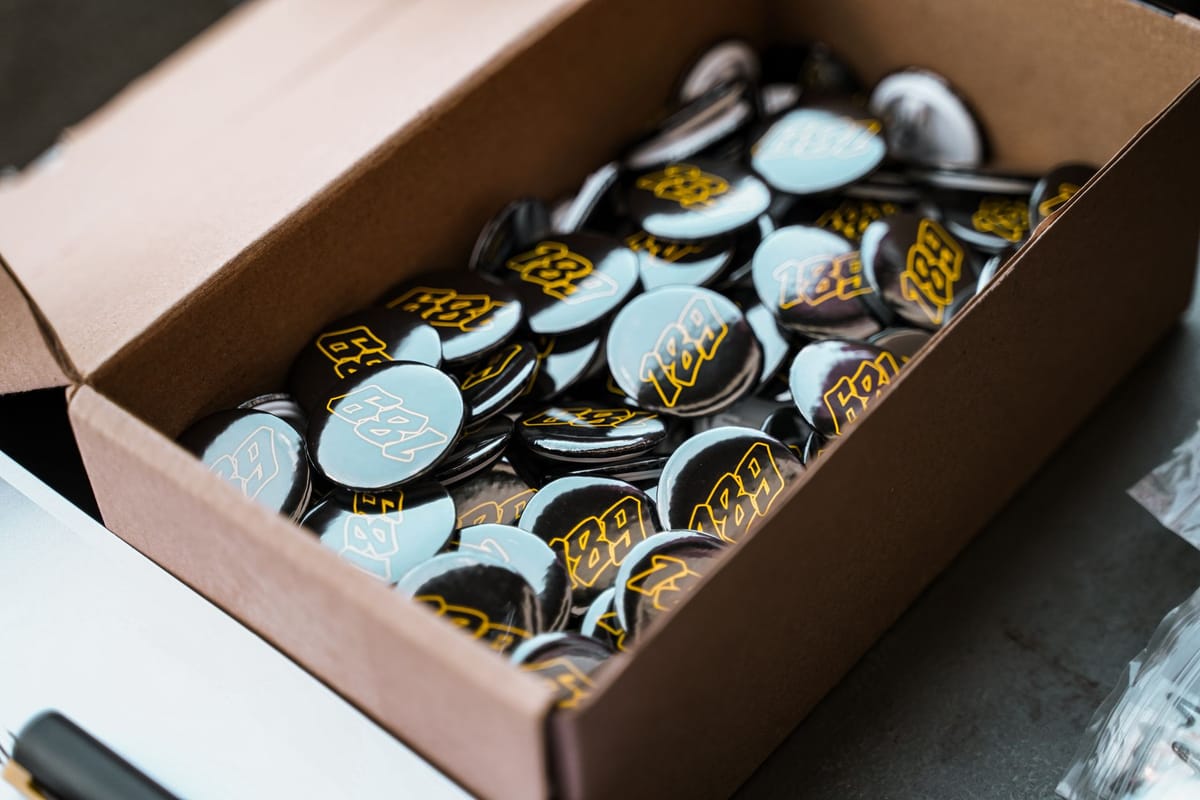 Branded giveaways laid out on an exhibition counter