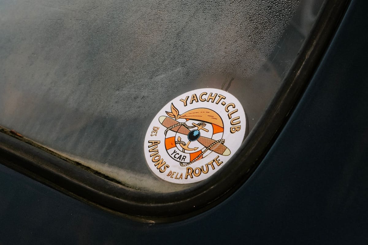 A perforated graphic on a car rear window