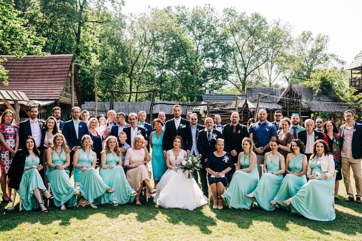 Guests posing at an event photo wall