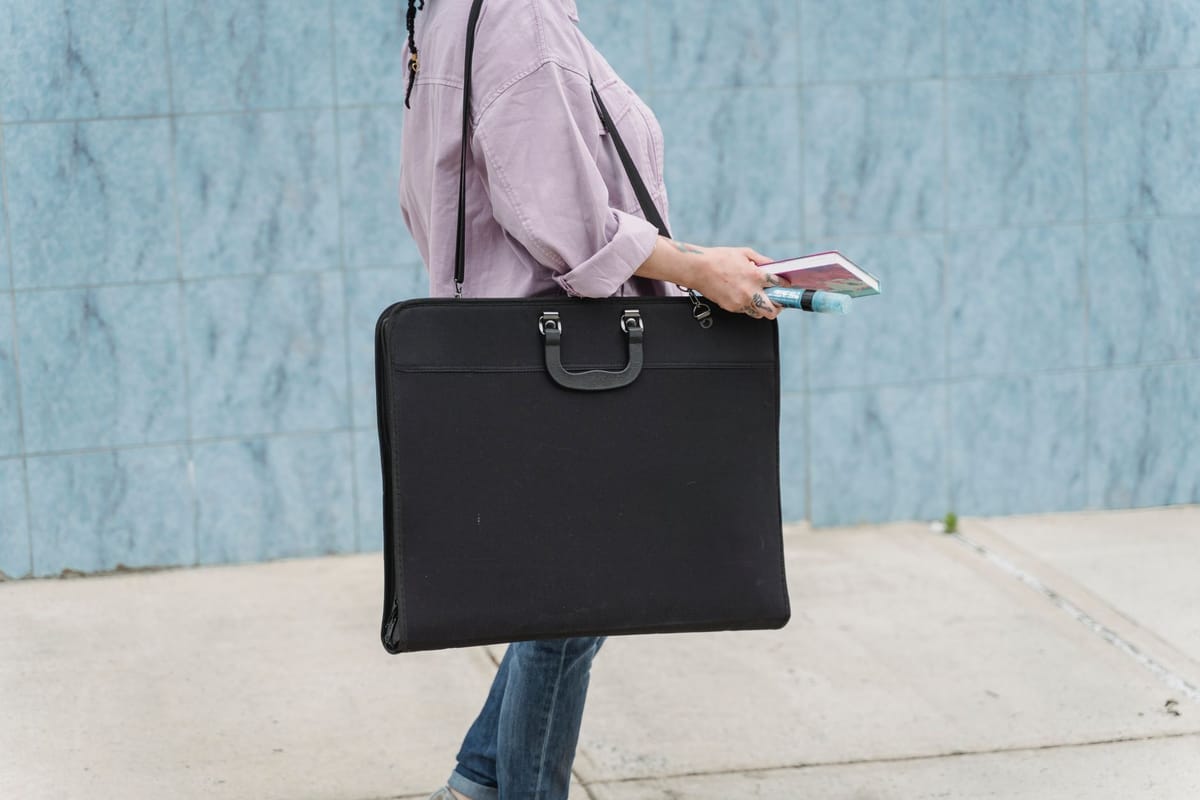 A roll-up banner packed into its padded carry bag
