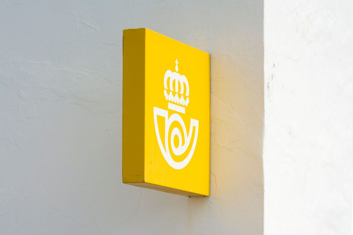 A wall-mounted banner held taut by its eyelets